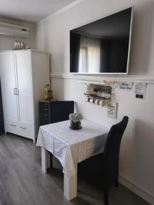TV a/nebo společenská místnost v ubytování Rooms Zana