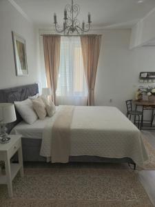 Postel nebo postele na pokoji v ubytování Rooms Zana