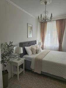 Postel nebo postele na pokoji v ubytování Rooms Zana