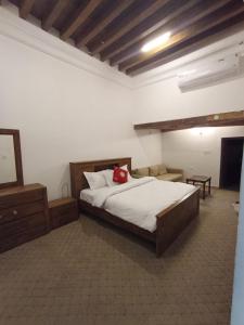 Ein Bett oder Betten in einem Zimmer der Unterkunft Hyba Heritage Guest House