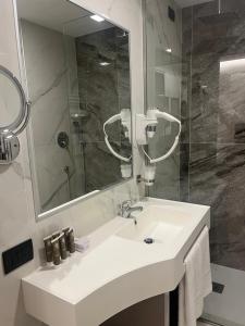 Koupelna v ubytování Jr Hotels Bocconi Milano + 17 fotografií
