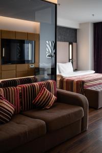TV a/nebo společenská místnost v ubytování 11 Mirrors Design Hotel