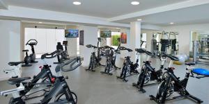 a gym with a bunch of bikes in a room at Hotel Ocean House Costa del Sol, Affiliated by Meliá in Torremolinos