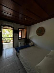 Postel nebo postele na pokoji v ubytování Pousada Brisamar Paraty COMECE O DIA COM UM CAFÉ DA MANHÃ INESQUECÍVEL