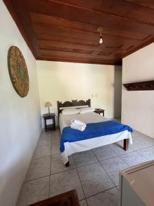 Postel nebo postele na pokoji v ubytování Pousada Brisamar Paraty COMECE O DIA COM UM CAFÉ DA MANHÃ INESQUECÍVEL