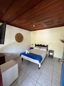 Postel nebo postele na pokoji v ubytování Pousada Brisamar Paraty COMECE O DIA COM UM CAFÉ DA MANHÃ INESQUECÍVEL