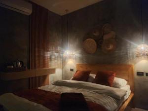 Un ou plusieurs lits dans un hébergement de l'établissement Haraja Boutique Resort