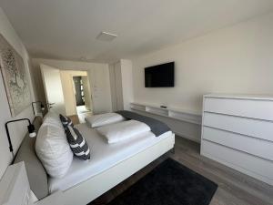 Postel nebo postele na pokoji v ubytování Hotel Barth