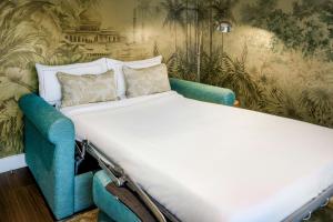 Cama o camas de una habitación en Cotton House Hotel, Autograph Collection
