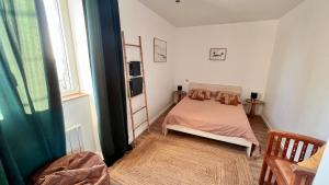 Posteľ alebo postele v izbe v ubytovaní Bel appartement, proche plages pour 4 personnes, 2 chambres