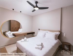 En eller flere senger på et rom på Gemini Resort
