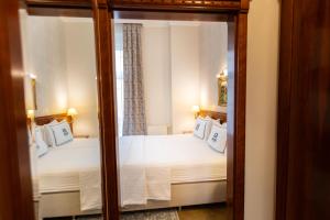 Posteľ alebo postele v izbe v ubytovaní Hotel Waldinger