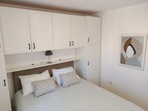 Posteľ alebo postele v izbe v ubytovaní Apartment Antišin