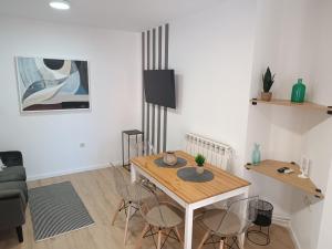 Televízia a/alebo spoločenská miestnosť v ubytovaní Apartment Antišin