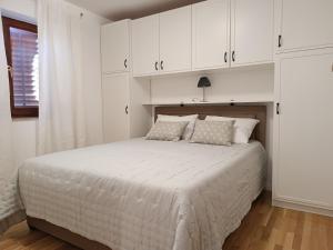 Posteľ alebo postele v izbe v ubytovaní Apartment Antišin
