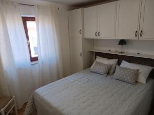 Posteľ alebo postele v izbe v ubytovaní Apartment Antišin