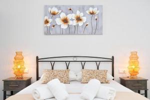 Postel nebo postele na pokoji v ubytování Louros rooms