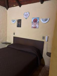 Postel nebo postele na pokoji v ubytování Hospedajes Millaray