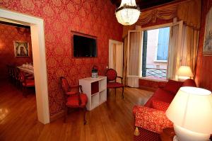 TV a/nebo společenská místnost v ubytování Residenza Bistrot De Venise