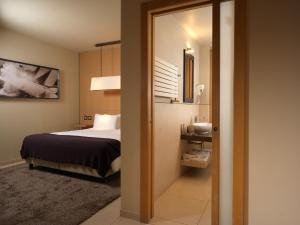 Katil atau katil-katil dalam bilik di Albergo Nicolin