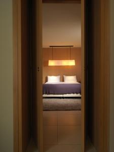 Katil atau katil-katil dalam bilik di Albergo Nicolin