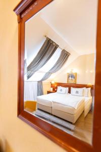 Posteľ alebo postele v izbe v ubytovaní Hotel Waldinger