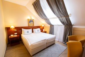 Posteľ alebo postele v izbe v ubytovaní Hotel Waldinger