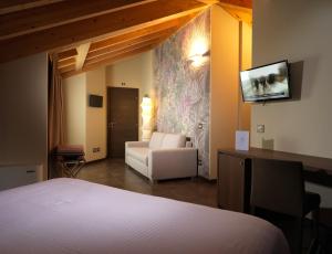 Katil atau katil-katil dalam bilik di Albergo Nicolin