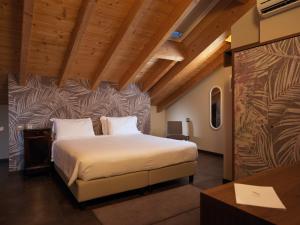 Katil atau katil-katil dalam bilik di Albergo Nicolin