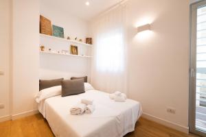 A bed or beds in a room at Casa Meltemi