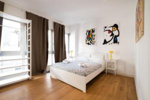 A bed or beds in a room at Casa Meltemi
