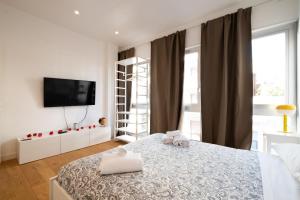 A bed or beds in a room at Casa Meltemi