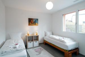 Postelja oz. postelje v sobi nastanitve Apartment Elona
