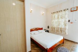 Postel nebo postele na pokoji v ubytování Margereth Cottage suite residence