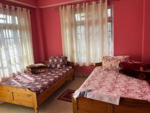 Ένα ή περισσότερα κρεβάτια σε δωμάτιο στο Mangar farm stay