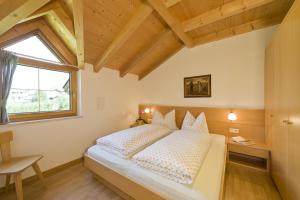 Postel nebo postele na pokoji v ubytování Pension Appartment Hecherhof + 37 fotografií