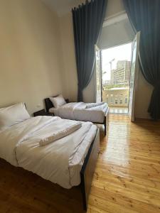 Postel nebo postele na pokoji v ubytování Hav hostel