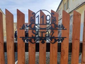 a gate with a sign that reads street at Ubytování Stráž in Stráž