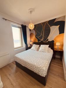 Postel nebo postele na pokoji v ubytování Villa Ker Eole Vue Mer