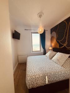 Postel nebo postele na pokoji v ubytování Villa Ker Eole Vue Mer