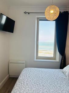 Postel nebo postele na pokoji v ubytování Villa Ker Eole Vue Mer
