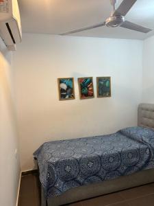 Ένα ή περισσότερα κρεβάτια σε δωμάτιο στο EDIFICIO REY NIÑO