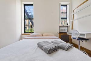 Katil atau katil-katil dalam bilik di Central Living Columbia University-1