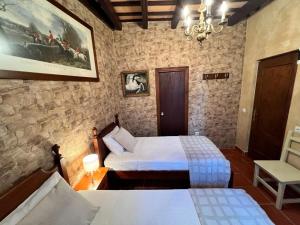 Postel nebo postele na pokoji v ubytování La Posada de Zepeda