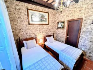 Postel nebo postele na pokoji v ubytování La Posada de Zepeda