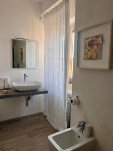 Koupelna v ubytování piazza Marconi Rooms
