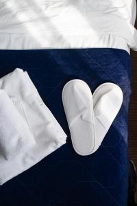 Voodi või voodid majutusasutuse Hotel Passport toas