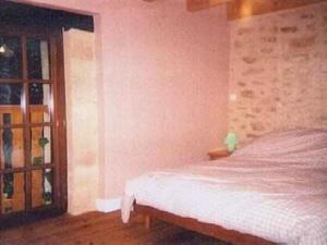 Postel nebo postele na pokoji v ubytování Jolie Hameau Pittoresque Allas