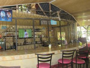 Ο χώρος του lounge ή του μπαρ στο Sunpark Chalets Malindi +26 φωτογραφίες