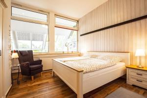 Postel nebo postele na pokoji v ubytování Fasanennest im Wikingerhof